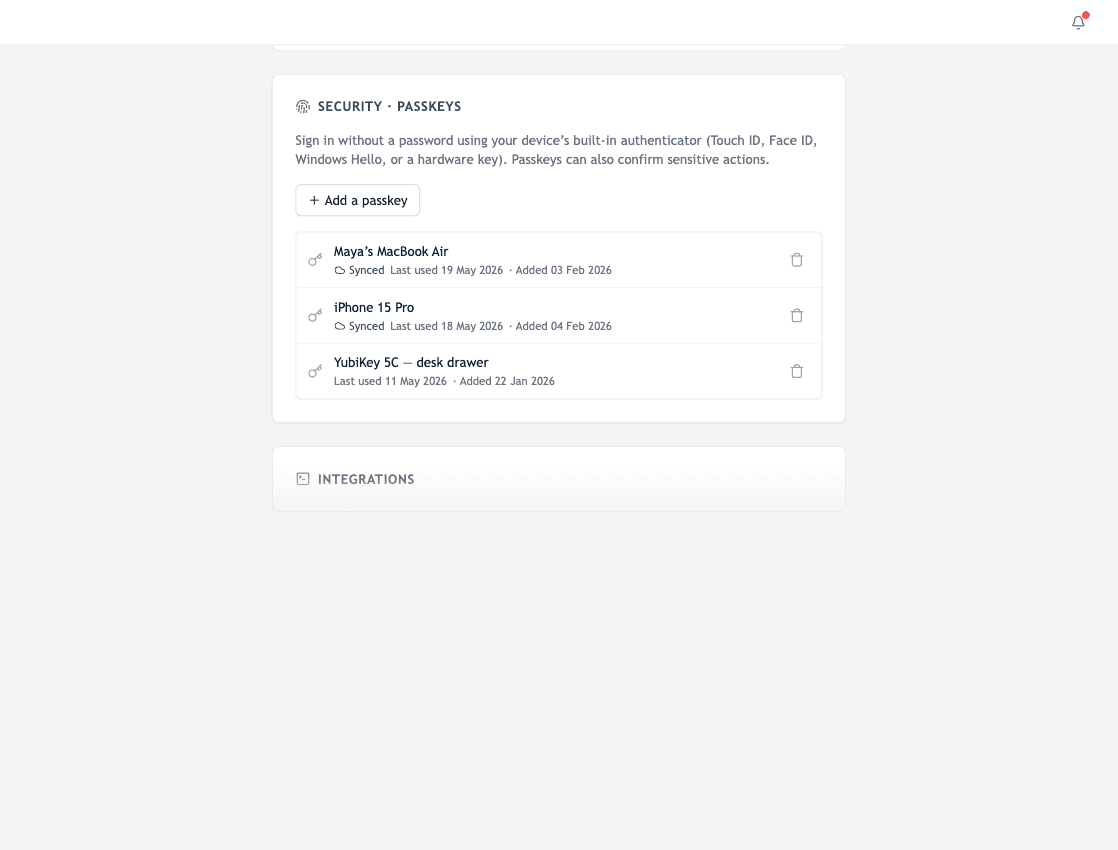 The Security · Passkeys card on the Profile page with Add a passkey button and existing devices listed